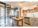 Modern kitchen featuring stainless steel appliances, open shelving, and a spiral staircase at 170 Boulevard Se # 521H, Atlanta, GA 30312