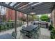 Outdoor kitchen with grill, bar seating, and spacious dining area, ideal for entertaining friends and Gathering at 170 Boulevard Se # 521H, Atlanta, GA 30312