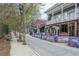 Charming street featuring outdoor dining, inviting storefronts, and a vibrant neighborhood atmosphere at 170 Boulevard Se # 521H, Atlanta, GA 30312