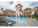Luxurious swimming pool surrounded by lounge chairs and elegant landscaping, offering a resort-style oasis for relaxation at 170 Boulevard Se # 521H, Atlanta, GA 30312