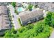 Aerial view of townhomes with decks, greenery, and a refreshing community pool at 2187 Elmont Se Way, Smyrna, GA 30080