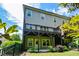 Exterior view shows the home's deck and outdoor living spaces with green foliage at 2187 Elmont Se Way, Smyrna, GA 30080