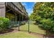 A fenced backyard shows neat landscaping that provides privacy and space at 2187 Elmont Se Way, Smyrna, GA 30080
