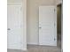 Bedroom features closet and door into a hall at 2187 Elmont Se Way, Smyrna, GA 30080