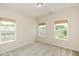 Bedroom with three windows and neutral carpet at 2187 Elmont Se Way, Smyrna, GA 30080