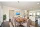 Bright dining room featuring wood table, chandelier lighting, and hardwood floors at 2187 Elmont Se Way, Smyrna, GA 30080