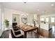 Bright dining room featuring wood table, chandelier lighting, and hardwood floors at 2187 Elmont Se Way, Smyrna, GA 30080