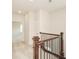 Upstairs hallway featuring carpet flooring, natural light, and access to other rooms at 2187 Elmont Se Way, Smyrna, GA 30080