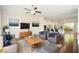 Living room features hardwood floors and an open floor plan to the kitchen and dining at 2187 Elmont Se Way, Smyrna, GA 30080