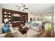 Living room features hardwood floors and an open floor plan to the kitchen and dining at 2187 Elmont Se Way, Smyrna, GA 30080
