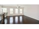 Bright loft area featuring three windows and dark, glossy wood floors at 2187 Elmont Se Way, Smyrna, GA 30080