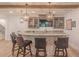 Basement bar area with granite countertops and seating at 232 Heron Pointe Vw, Canton, GA 30114