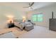 Spacious bedroom featuring a king bed, wooded view, and modern decor at 232 Heron Pointe Vw, Canton, GA 30114