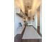 Inviting foyer with a staircase, wood floors, shiplap walls, and stylish decor at 232 Heron Pointe Vw, Canton, GA 30114