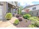 Attractive home exterior with a well-manicured lawn and colorful landscaping at 232 Heron Pointe Vw, Canton, GA 30114
