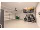 Spacious garage with epoxy flooring, storage solutions, and a golf cart at 232 Heron Pointe Vw, Canton, GA 30114