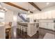 Bright kitchen featuring a central island with barstools, stainless appliances, and elegant white cabinetry at 232 Heron Pointe Vw, Canton, GA 30114