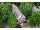 Aerial view of a home with lush, mature trees and a well-maintained yard at 380 Kendrick Se Ave, Atlanta, GA 30315
