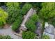 Aerial view of a gray roof with lots of surrounding green trees at 380 Kendrick Se Ave, Atlanta, GA 30315