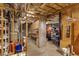 Spacious unfinished basement with exposed ceiling, utilities, and storage, offering potential for customization at 380 Kendrick Se Ave, Atlanta, GA 30315
