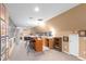 Large finished basement features a wet bar, seating area, and eclectic gallery wall at 380 Kendrick Se Ave, Atlanta, GA 30315