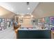 Relaxing basement lounge area with plush seating, warm lighting, and walls adorned with framed music posters at 380 Kendrick Se Ave, Atlanta, GA 30315