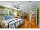 Airy bedroom showcases hardwood floors and abundant natural light with seamless flow into a sitting room at 380 Kendrick Se Ave, Atlanta, GA 30315