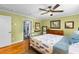 Comfortable bedroom features hardwood floors and natural light; a peaceful retreat within the home at 380 Kendrick Se Ave, Atlanta, GA 30315