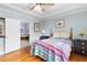 Bedroom boasts hardwood floors, neutral paint, and adjacent bathroom at 380 Kendrick Se Ave, Atlanta, GA 30315