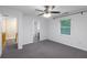 Bedroom with ceiling fan, plush carpet and access to an ensuite bathroom at 380 Kendrick Se Ave, Atlanta, GA 30315