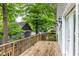 Wooden deck overlooking lush greenery, providing a serene outdoor space for relaxation and entertainment at 380 Kendrick Se Ave, Atlanta, GA 30315