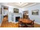 Cozy dining room with fireplace, wood floors, and seating, perfect for intimate gatherings at 380 Kendrick Se Ave, Atlanta, GA 30315