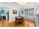 Dining room featuring hardwood floors, neutral walls, and nearby views to an office space at 380 Kendrick Se Ave, Atlanta, GA 30315