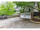 This home features a long driveway leading to a two-car garage at 380 Kendrick Se Ave, Atlanta, GA 30315