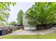 This home features a long driveway leading to a two-car garage and beautiful landscaping at 380 Kendrick Se Ave, Atlanta, GA 30315