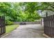 A long driveway with an open gate and a small patch of grass at 380 Kendrick Se Ave, Atlanta, GA 30315