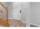 Welcoming foyer with patterned tile flooring, stairs, and a white front door creating a bright entrance at 380 Kendrick Se Ave, Atlanta, GA 30315