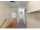 Hallway features neutral walls and carpeting that provides access to various rooms at 380 Kendrick Se Ave, Atlanta, GA 30315