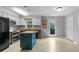Updated kitchen featuring a blue island, stainless steel appliances, and ample counter space at 380 Kendrick Se Ave, Atlanta, GA 30315