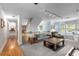 Open floor plan showcases an upstairs living area with a fireplace, staircase, and hardwood floors at 380 Kendrick Se Ave, Atlanta, GA 30315