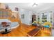 Living room features hardwood floors, natural light, and a staircase at 380 Kendrick Se Ave, Atlanta, GA 30315