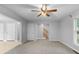 Bright living room with a stairway to the second level and a window to the outdoors at 380 Kendrick Se Ave, Atlanta, GA 30315