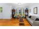 Bright living room features hardwood floors, a bay window, and neutral paint at 380 Kendrick Se Ave, Atlanta, GA 30315