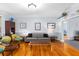 Living room featuring hardwood floors, comfortable seating, and built-in globe display at 380 Kendrick Se Ave, Atlanta, GA 30315