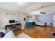 The main bedroom features hardwood floors, a sitting area, and natural light from multiple windows at 380 Kendrick Se Ave, Atlanta, GA 30315