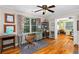 Home office with hardwood floors, multiple windows, and access to adjacent room at 380 Kendrick Se Ave, Atlanta, GA 30315