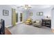 Cozy sitting room with neutral carpeting and double doors to the outside at 380 Kendrick Se Ave, Atlanta, GA 30315