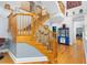 Entry hall with a classic wooden staircase leading to the upper level at 380 Kendrick Se Ave, Atlanta, GA 30315