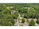 Aerial view of the home nestled within a lush, wooded community at 1125 Harvest Brook Way, Lawrenceville, GA 30043