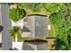 Aerial view of the house showcasing the roof and backyard with lush surroundings at 1125 Harvest Brook Way, Lawrenceville, GA 30043